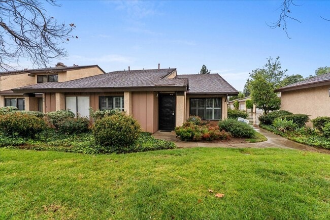 Building Photo - Private Street-Access Condo with Garage, Courtyard, Pool and Tennis