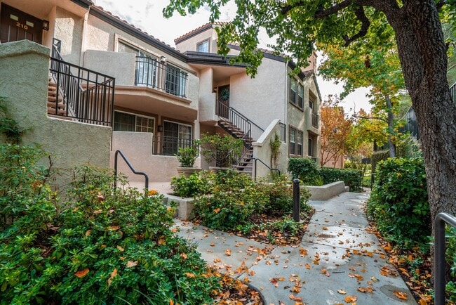 Building Photo - COMING SOON! 2-Bedroom Condo with some Uti... Unit 211