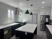 Photo - 6132 W 6th St Townhome