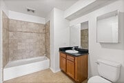 2BR, 1BA - 938SF - Romana - Bathroom - Villa Touran Apartments