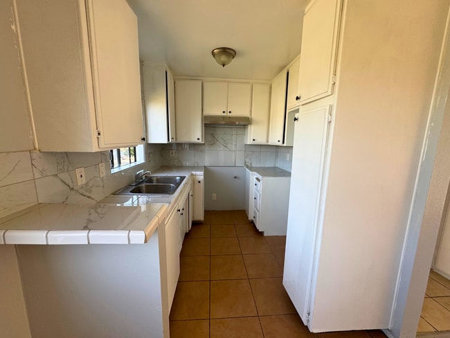 Building Photo - 14810 Parthenia St Unit APT 210