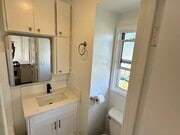 Photo - Located on a large lot, along with only four other cottage units, sits this 2 bedroom 1 bath unit