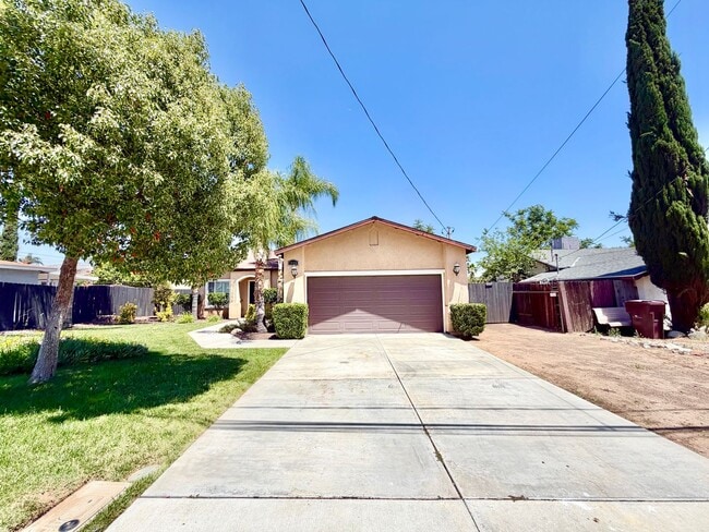 Building Photo - Beautifully Renovated 4 Bedroom Home with INCLUDED Solar, Large Backyard & Gazebo