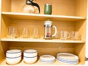 French press, tea kettle and dishware. - 220 Woodland Pky Condo Unit 250