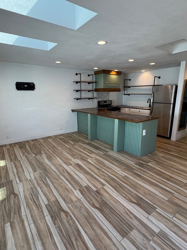 Building Photo - Cozy Carson Back House with Skylights & Washer/Dryer Unit 2674