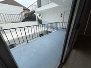 View from living onto balcony 1 - 1649 Appian Way Unit 210
