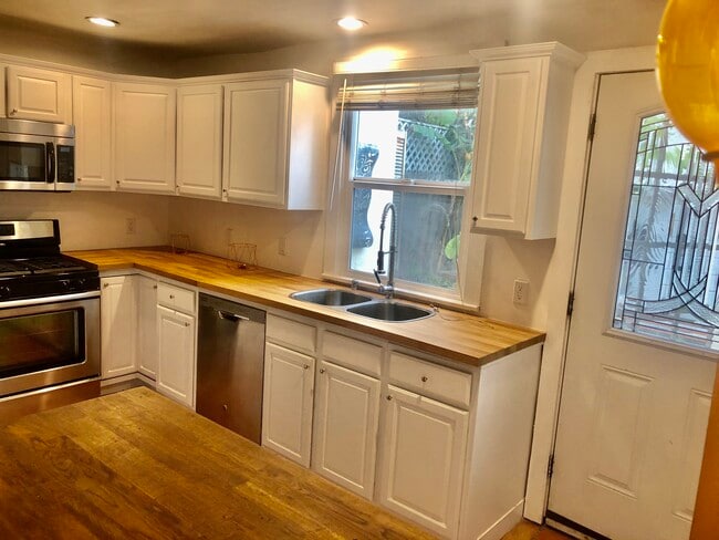 Remodeled kitchen w/butcher block countertops - 6107 Saturn St Unit c