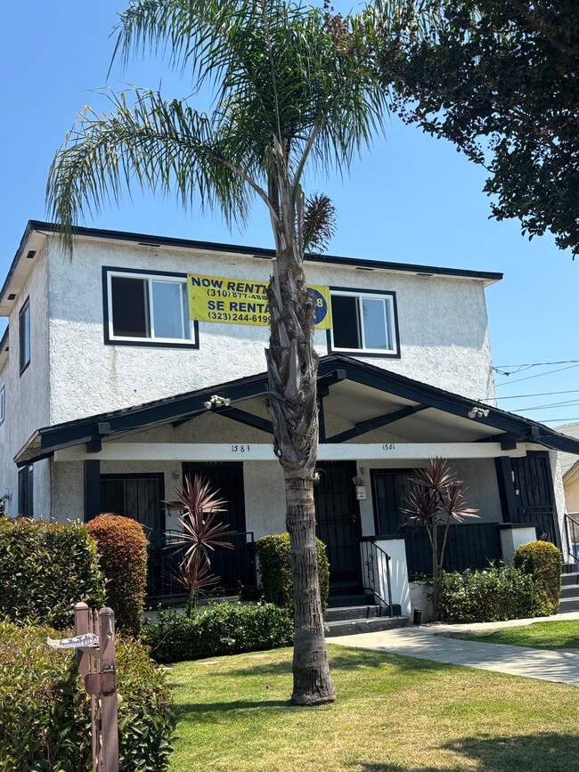 Building Photo - 1581 1/2 W 36th Pl Unit 1581 1.2 Rental