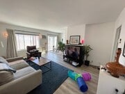 Living room unit 5 - 2645 28th St Apartments