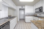 3BR, 2BA - 1,150SF - Kitchen - Duane Heights Apartments