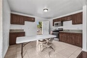 Photo - 1401 E 118th St Townhome