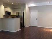 Main living area with kitchen & dining area - 1801 E Katella Ave Condo Unit 1136
