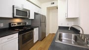 Kitchen with Stainless Steel Appliances - Sonterra at Foothill Ranch