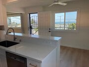 Note the XL picture window on far left - that's the living room window. - 1039 6th St