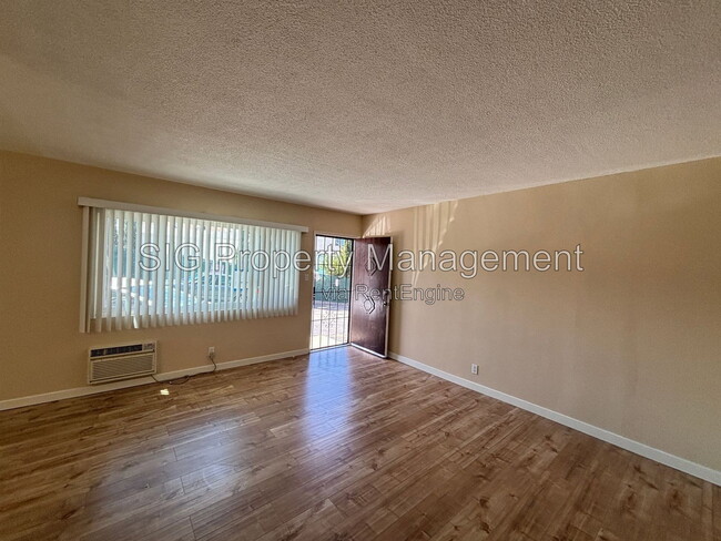Building Photo - 10237 Commerce Ave Unit 1