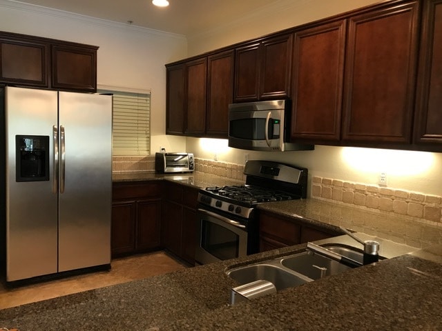 Building Photo - 10715 Camarillo St Unit 201