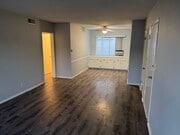 living room with dining room - 2013-2015 S Corning St Apartments