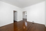 2BR, 1.5BA - 675SF - Living Room - 8214 Norton Ave