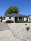 6 Car Driveway with gated entrance leading to 2 Car Garage - 5457 Beck Ave House