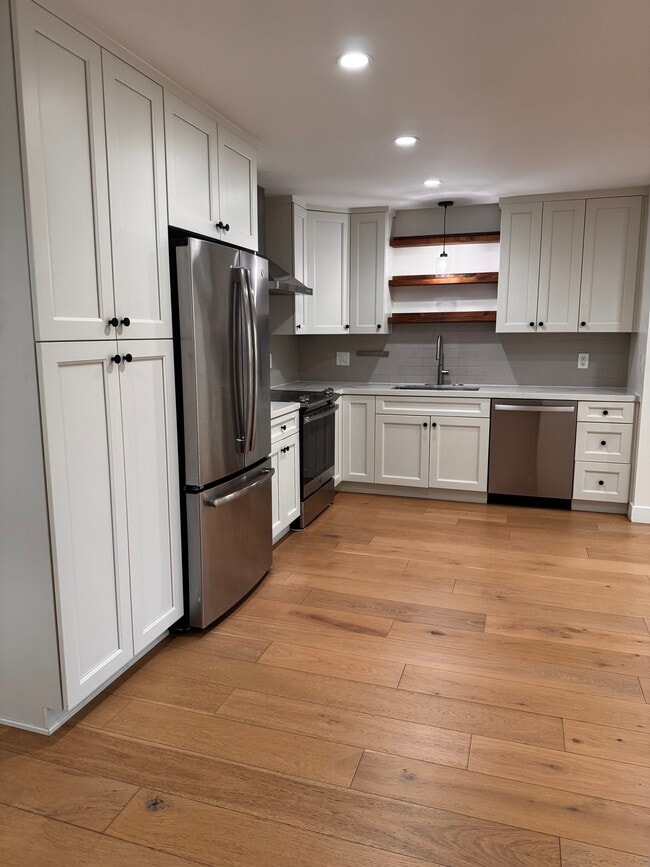 Building Photo - 5830 Benner St Unit 207