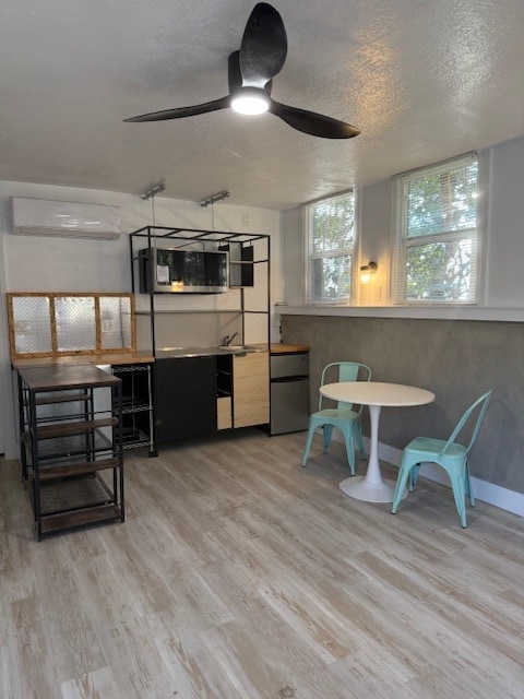 Efficient kitchenette with induction cooking + convection microwave/air fryer (cooktop stores away). - 24606 University Ave