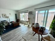 Living room to balcony unit 5 - 2645 28th St Apartments