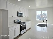 Photo - 1354 E 94th St Townhome