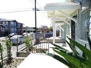 side view - 4057 S Raymond Ave