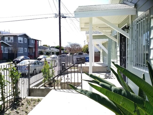 side view - 4057 S Raymond Ave