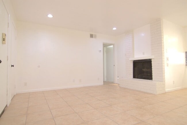 Photo - Charming 1-Bedroom Condo with Fireplace & Private Balcony – Gated Community