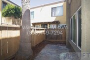 Photo - 1 Bed, 1 Bath Condo in Gated Community with Private Backyard & In-Unit Laundry Unit 5