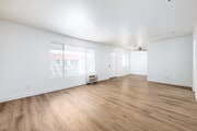 2BR, 1BA - 965SF - Living Room - Pioneer Plaza