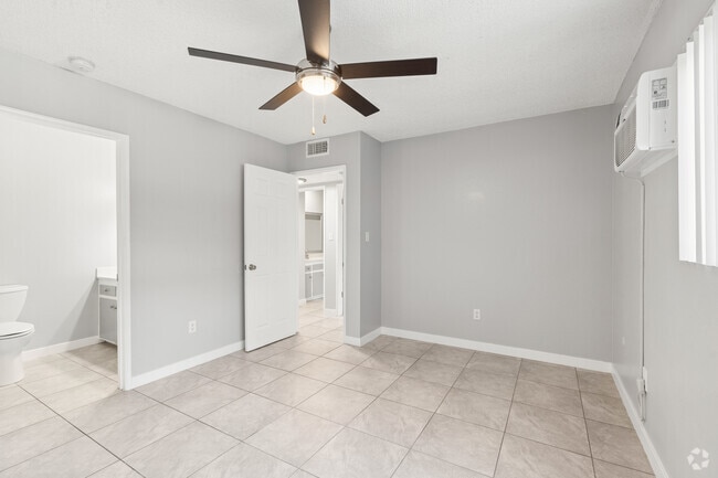2BR, 2BA - 900SF - Primary Bedroom - Spanish Oaks