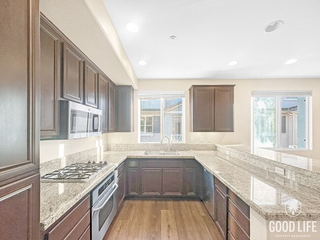 Photo - Modern 3-Story Townhome in Bay Park – 3BR/3.5BA with Pool, Balcony & In-Unit Laundry