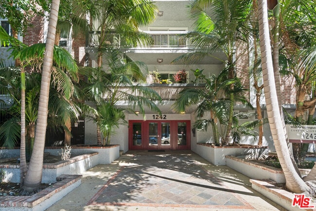 Building Photo - 1242 S Barrington Ave Unit 304