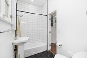 2BR, 1.5BA - 675SF - Bathroom - 8214 Norton Ave