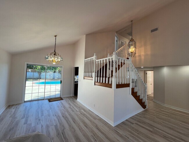 Photo - Reseda 4+3 w/fireplace, vaulted ceilings, new flooring, solar panels, + pool! (7522 Balcom Ave)