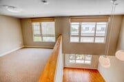 Loft-style living available in the townhomes with large windows for beautiful light - 5550 Wilshire at Miracle Mile by Windsor Apartments