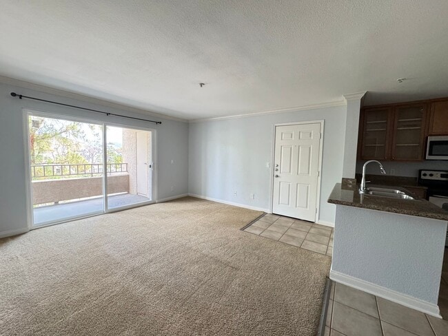 Building Photo - Magnificent 1 Bedroom Condo in Triana in Corona Ranch