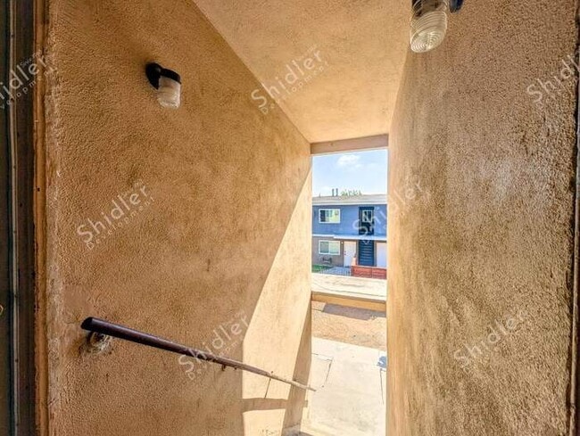 Photo - Upstairs 2 Bedroom 1 Bath with Massive Walk In Closet, Covered Gated Parking