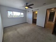 Photo - Spacious 4 bed 2 bath + 2 car garage & lar...