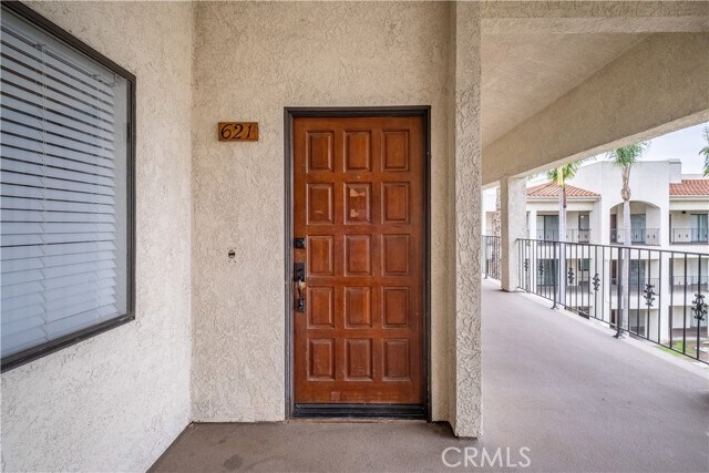 Building Photo - 11620 Warner Ave Unit 621
