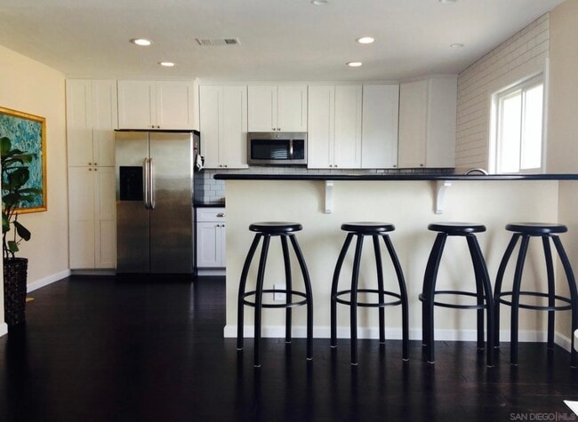 Open concept updated kitchen - 357 Winsome Pl