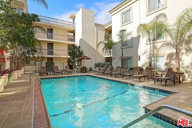 Building Photo - 141 S Clark Dr Unit 208