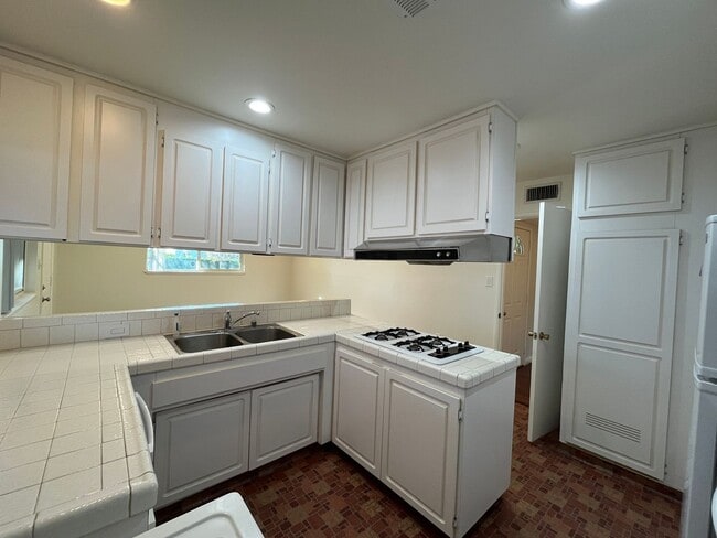 Photo - MOVE IN READY 3+2 home in Northridge w/RV access, appliances included + central HVAC!