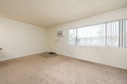 Studio - 355SF - Living Room - Tahitian Village Apartments
