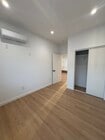 Primary bedroom with air conditioning in each room. - 7834 S Harvard Blvd House