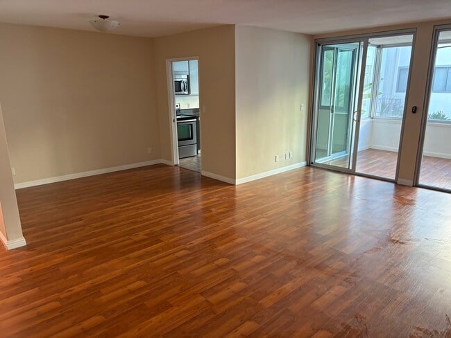Living/Dining area - 8701 Delgany Ave Unit 111