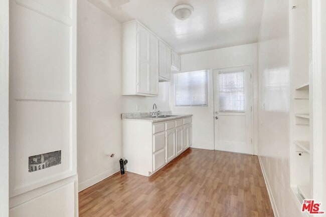 Building Photo - 6340 10th Ave Unit 6402 1/2 Rental