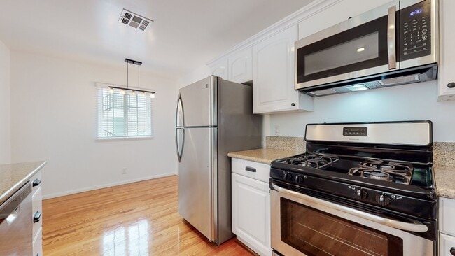Building Photo - 10876 National Blvd Unit 10876